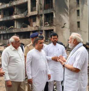 PM Narendra Modi inspects Air India crash site in Ahmedabad, speaks with rescue workers and victims' families.