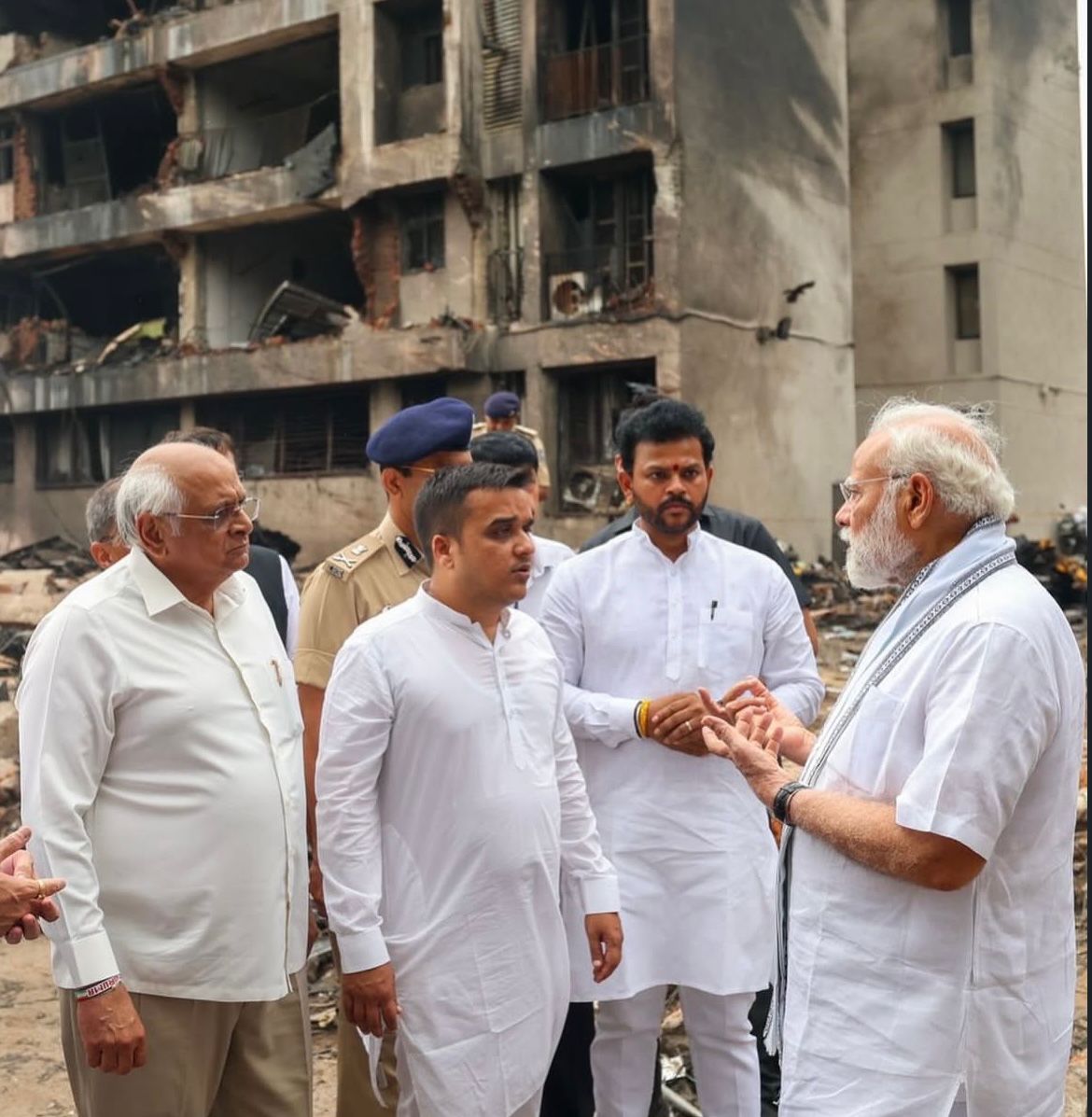 PM Narendra Modi inspects Air India crash site in Ahmedabad, speaks with rescue workers and victims' families.